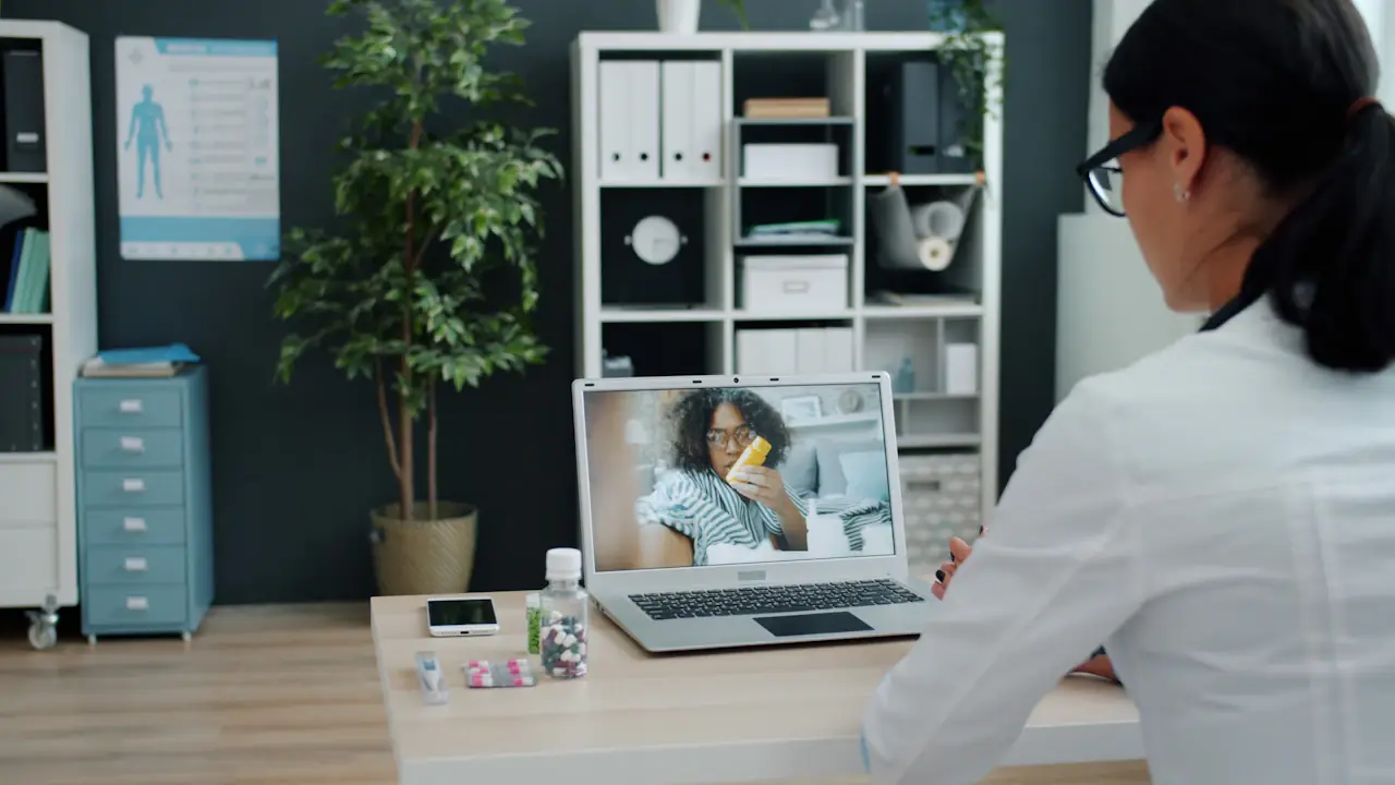 A doctor on a video consultation with a patient