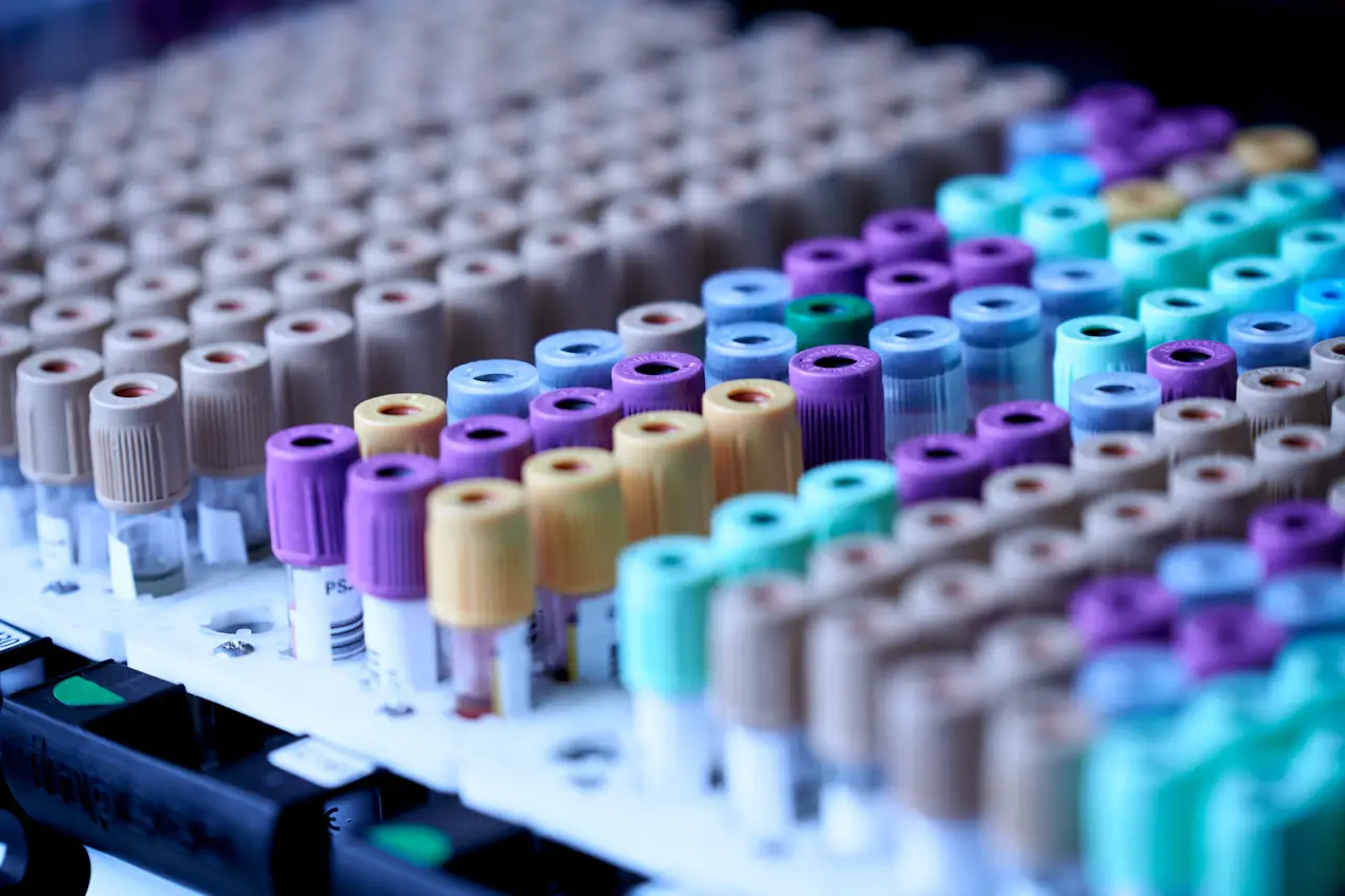 Rows of colour-capped sample tubes in a lab
